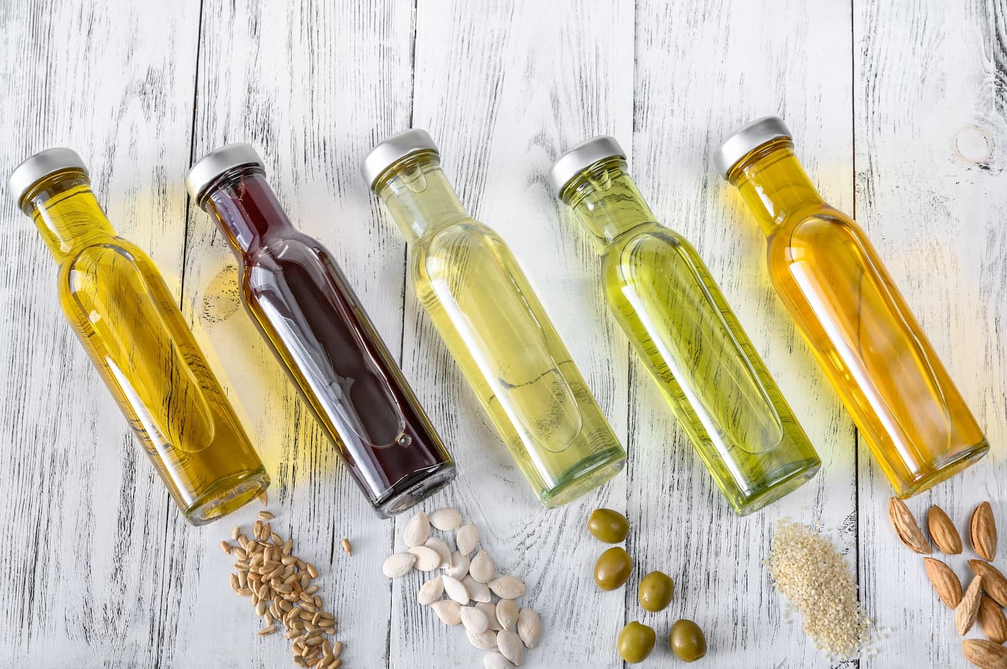 An image of vegetable oils in bottles.