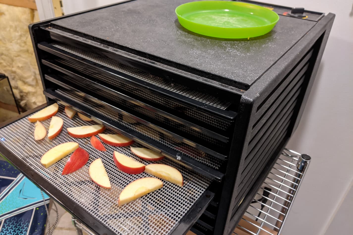 An image of our Excalibur dehydrator running apples.