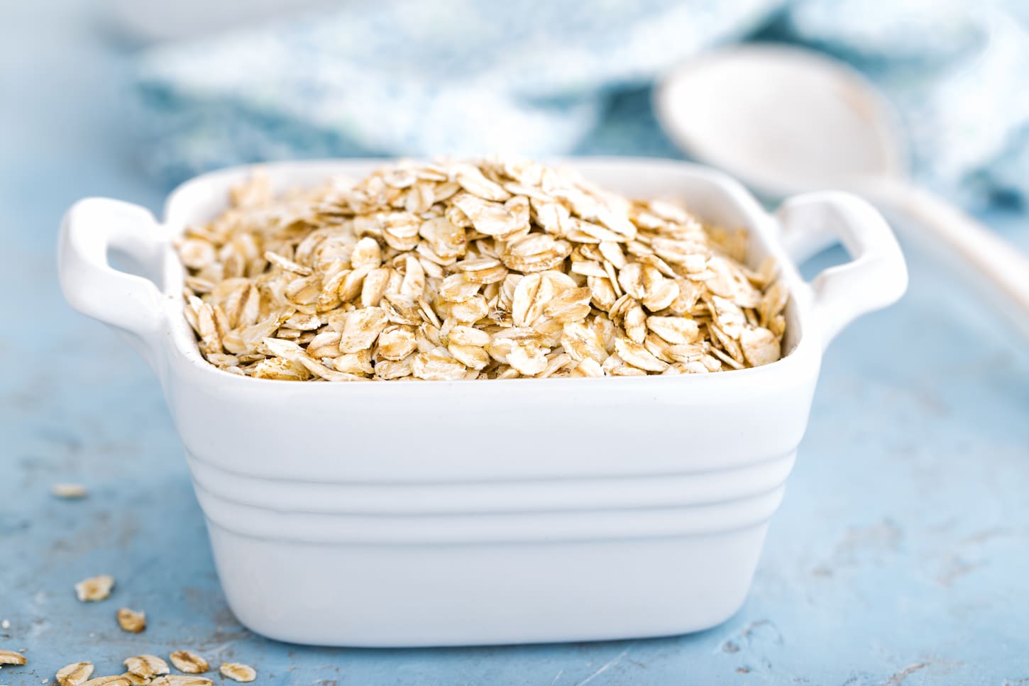 An image of Oat flakes in a white bowl.