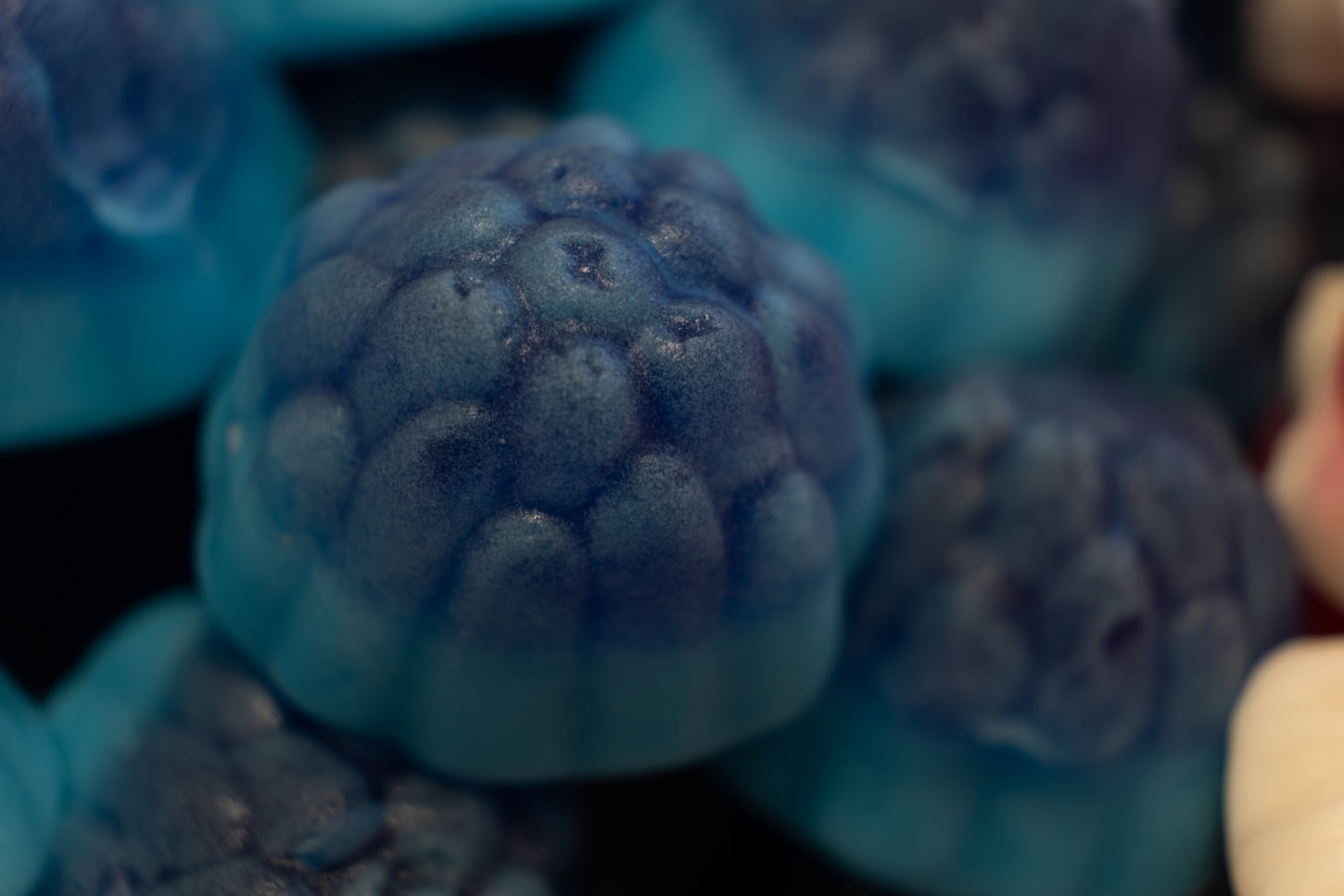 An image of a Jelly like a little blue raspberry in the candy shop.