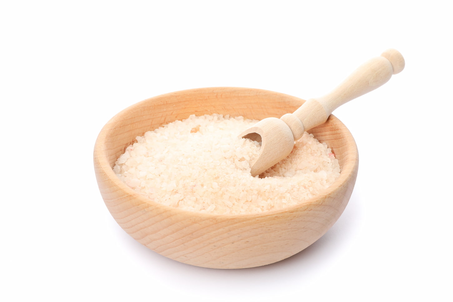 An image of a Wooden bowl with sea salt isolated on white background.
