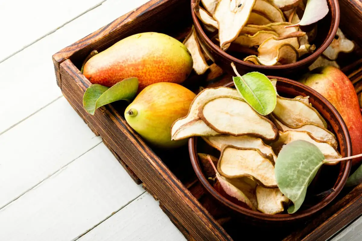 An image of fresh, dry, and freeze-dried pears in a basket.